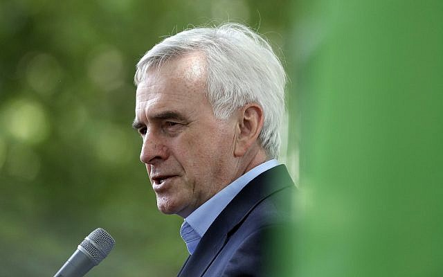 Labour MP John McDonnell, Shadow Chancellor, speaks ahead of the Grenfell fire one-year anniversary solidarity march organized by Justice4Grenfell and the Fire Brigade's Union, in Westminster in London, June 16, 2018. (AP Photo/Kirsty Wigglesworth)