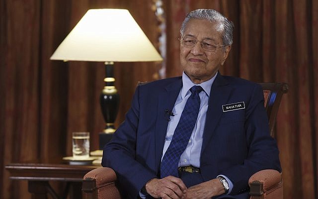 Malaysia Prime Minister Mahathir Mohamad listens during an interview with The Associated Press in Putrajaya, Malaysia, Monday, August 13, 2018. (Yam G-Jun/AP)