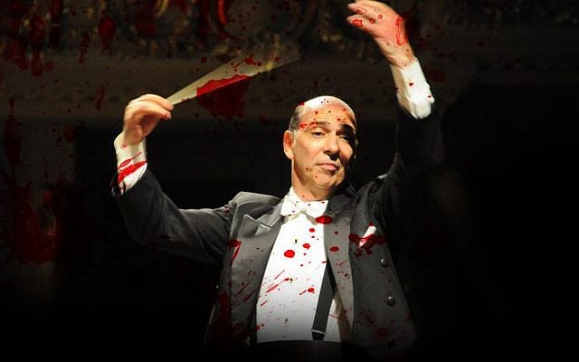 Poster distributed by the BDS movement of Chile showing Yeruham Scharovsky, conductor of the Jerusalem Symphony Orchestra, covered in blood. (Twitter)