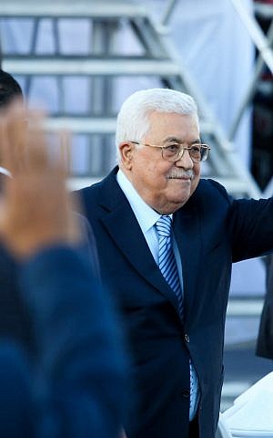 Palestinian President Mahmud Abbas attends a mass wedding ceremony in the West Bank city of Ramallah on August 18, 2018. (Flash90)