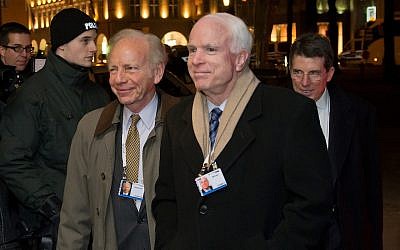 US Senator Joseph Lieberman (L) and US Senator John McCain  arrive for the 50th Munich Security Conference in the Bayerischer Hof hotel on January 31, 2014 in Munich, Germany. (Joerg Koch/Getty Images via JTA)