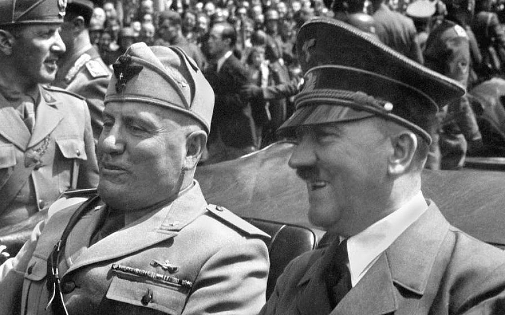 Mussolini and Hitler during a parade celebrating their alliance (public domain)