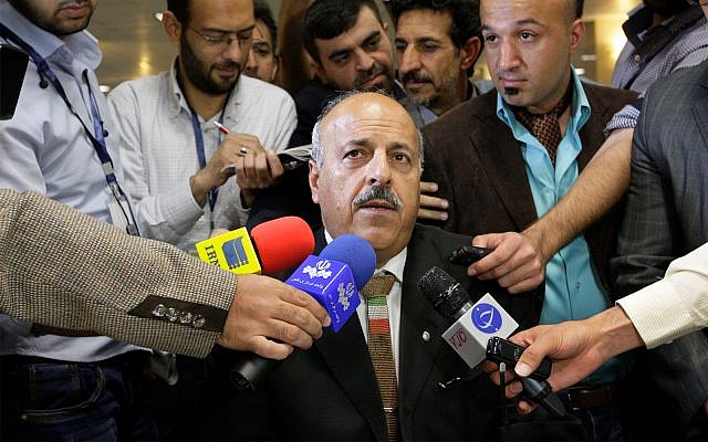 Ghasem Sholeh-Saadi speaks with media as he registers his candidacy for an upcoming presidential election in Tehran, Iran, Tuesday, May 7, 2013. (AP Photo/Vahid Salemi)