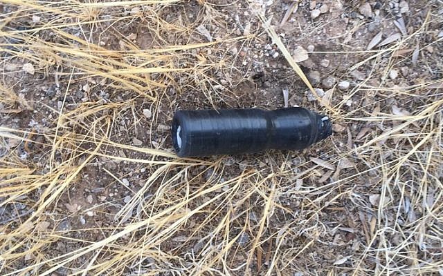 A pipe bomb found in the possession of three Palestinian suspects outside the West Bank village of Deir al-Hatab on August 30, 2018. (Israel Defense Forces)