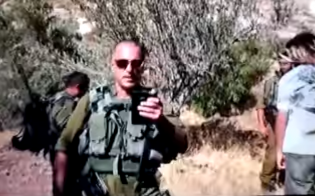 St. Sgt. Alon Segev, 40, an IDF reservist, was filmed on August 11, 2018 by a member of the Ta'ayush Jewish-Arab rights group in the Hebron Hills area striking the activist. (YouTube screen capture)