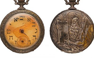 A watch featuring Hebrew letters that belonged to a man who died aboard the Titanic (Twitter via JTA)