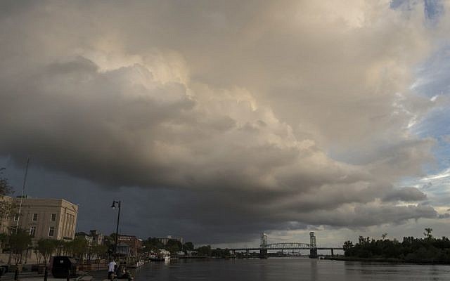 A large rain cloud passes over a day before the arrival of hurricane Florence in Wilmington, North Carolina, on September 12, 2018.(AFP PHOTO / ANDREW CABALLERO-REYNOLDS)