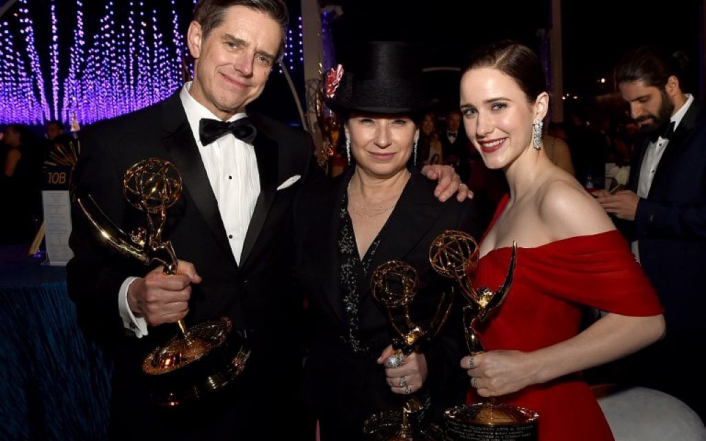 Daniel Palladino, winner of the Outstanding Comedy Series award for 'The Marvelous Mrs. Maisel'; Amy Sherman-Palladino, winner of the Outstanding Comedy Series award, Outstanding Writing for a Comedy Series award, and Outstanding Directing for a Comedy Series award for 'The Marvelous Mrs. Maisel'; and Rachel Brosnahan, winner of the Outstanding Lead Actress in a Comedy Series award for 'The Marvelous Mrs. Maisel' attend the 70th Emmy Awards Governors Ball at Microsoft Theater on September 17, 2018 in Los Angeles, California. (Kevin Winter/Getty Images/AFP)