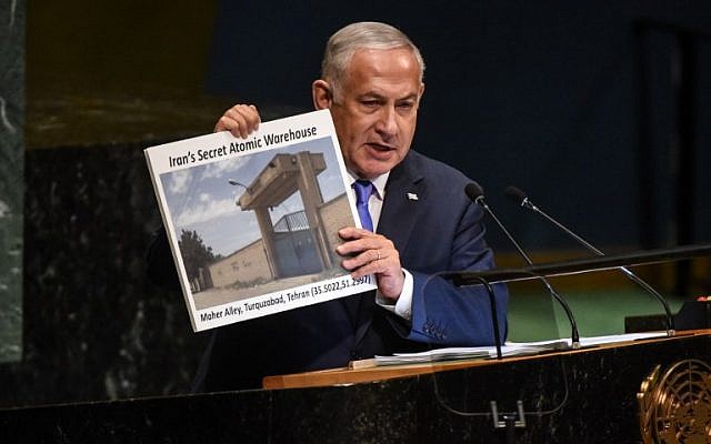 Prime Minister Benjamin Netanyahu holds up a placard showing a suspected Iranian atomic site while delivering a speech at the United Nations during the United Nations General Assembly on September 27, 2018 in New York City. (Stephanie Keith/Getty Images/AFP)