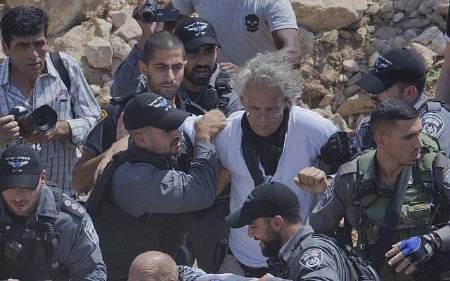 Israeli border police arrest American university professor Frank Romano in the West Bank Bedouin community of Khan al-Ahmar on September 14, 2018 (AP Photo/Nasser Nasser, File)