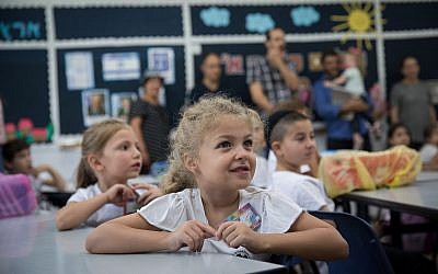 First-grade students sit in a classroom on their first day of school at Efrata elementary school in Jerusalem, on September 2, 2018. (Hadas Parush/Flash90)