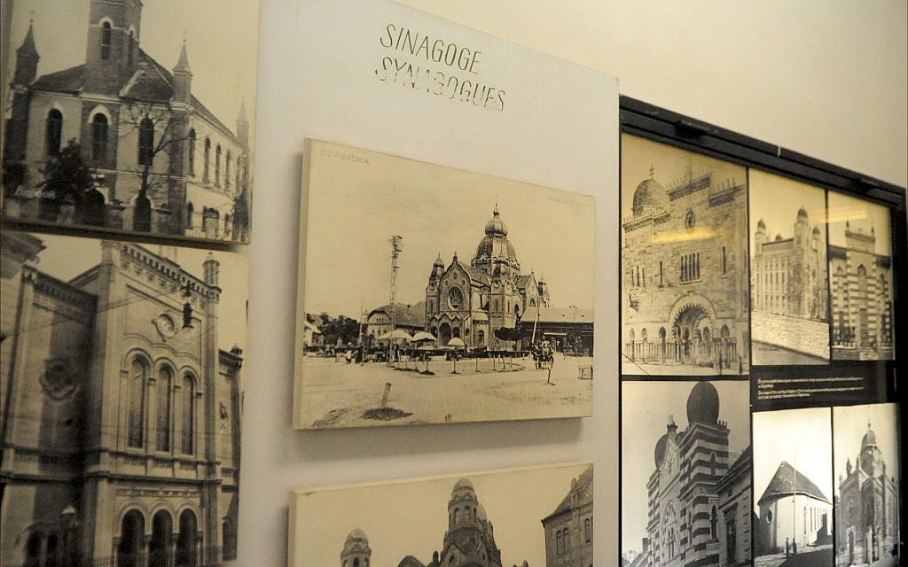 Photographs of historic synagogues throughout the former Yugoslavia are on display at the Jewish Historical Museum in Belgrade, June 2018. (Larry Luxner/Times of Israel)