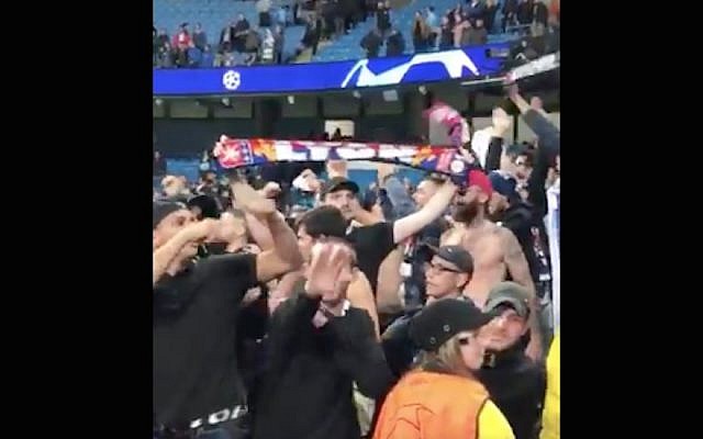 A Lyon fan making a Nazi salute at a game in Manchester, England, Sept. 19, 2018. (Screenshot from Twitter via JTA)