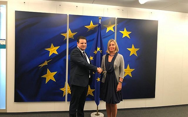 Joint (Arab) List chairman MK Ayman Oudeh, left, with EU foreign policy chief Federica Mogherini in Brussels, September 4, 2019 (courtesy Joint List)