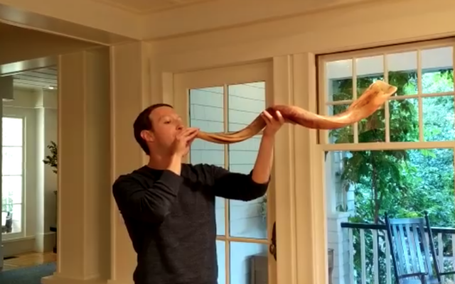 Mark Zuckerberg blows the shofar (Mark Zuckerberg/Facebook)