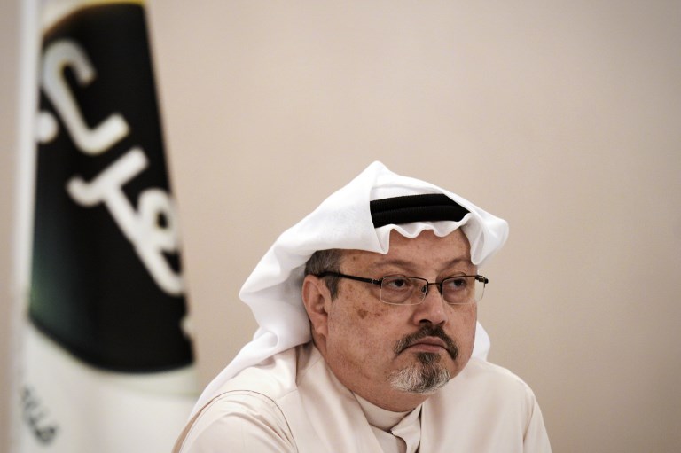 In this photo taken on December 15, 2014, Jamal Khashoggi looks on at a press conference in the Bahraini capital Manama. (AFP/Mohammed Al-Shaikh)