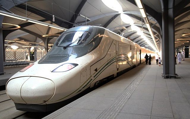Saudi passengers walk on the platform at Mecca's train station on October 11, 2018 as the new high-speed railway line linking Mecca and Medina opens. (Bandar Aldandani/AFP)