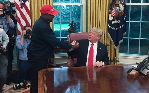 US President Donald Trump meets with rapper Kanye West in the Oval Office of the White House in Washington, DC, October 11, 2018. ( SEBASTIAN SMITH / AFP)