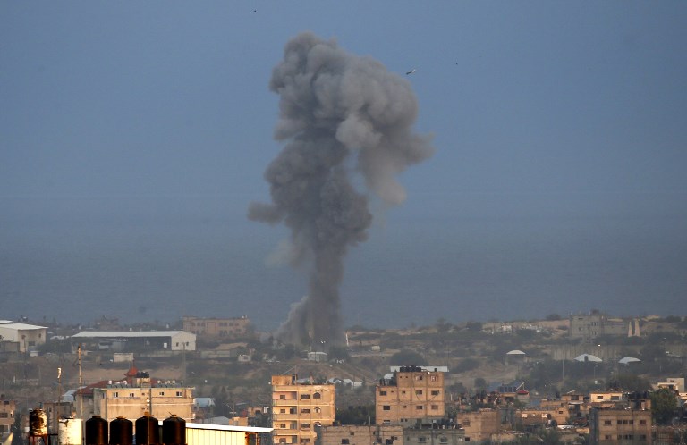 Smoke billows following an Israeli airstrike in the southern Gaza Strip city of Rafah on October 17, 2018. (Said Khatib/AFP)