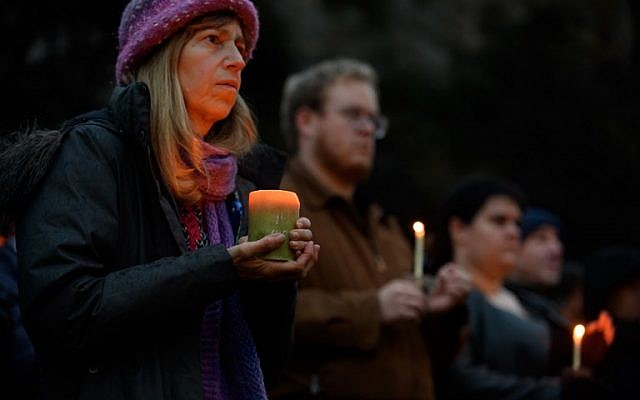People gather for a interfaith candlelight vigil a few blocks away from the site of a mass shooting at the Tree of Life Synagogue on October 27, 2018 in Pittsburgh, Pennsylvania.    (Jeff Swensen/Getty Images/AFP)