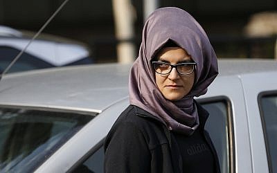 A woman who identified herself as Hatice A., the Turkish fiancee of Saudi journalist Jamal Khashoggi, walks outside the Saudi Arabia consulate in Istanbul on October 3, 2018. (AP Photo/Lefteris Pitarakis)