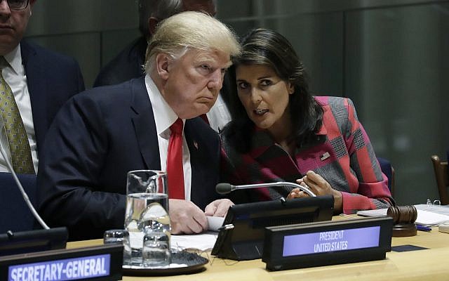 In this photo from September 24, 2018, US President Donald Trump talks to Nikki Haley, the US Ambassador to the United Nations, at the UN General Assembly at UN headquarters. (AP Photo/Evan Vucci, File)