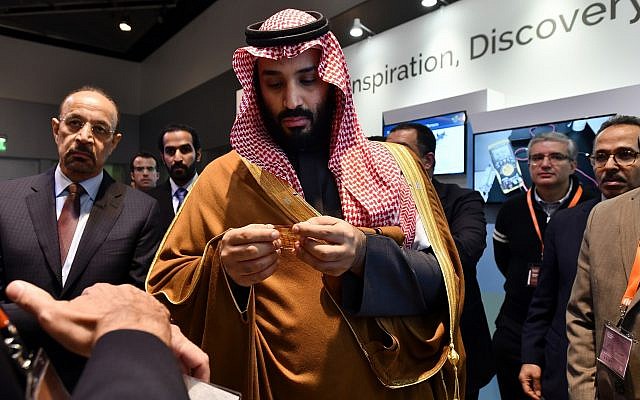 Saudi Arabia Crown Prince Mohammed bin Salman tours an innovation gallery of Saudi Arabian technology, including an exhibit by King Abdullah University of Science and Technology, during a visit to Massachusetts Institute of Technology in Cambridge, Mass., March 24, 2018. (Josh Reynolds/AP Images for KAUST)