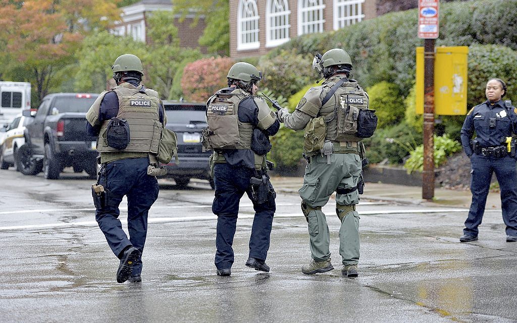 Police respond to an active shooter situation at the Tree of Life synagogue on Wildins Avenue in the Squirrel Hill neighborhood of Pittsburgh, Pennsylvania, on Saturday, October 27, 2018. (Pam Panchak/Pittsburgh Post-Gazette via AP)