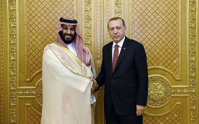 Turkey's President Recep Tayyip Erdogan, right, shakes hands with Saudi Crown Prince Mohammed bin Salman, prior to their meeting in Jiddah, Saudi Arabia, on July, 23, 2017. (Presidency Press Service/Pool Photo via AP)