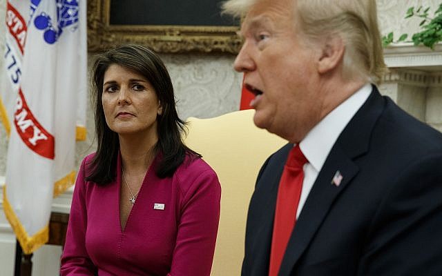 Then-US President Donald Trump speaks during a meeting with outgoing US Ambassador to the United Nations Nikki Haley in the Oval Office of the White House, October 9, 2018. (AP Photo/Evan Vucci)