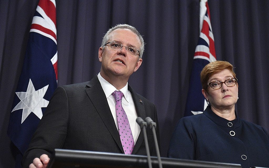 Prime Minister Scott Morrison, left, speaks to the media alongside Minister for Foreign Affairs Marise Payne at the Parliament House in Canberra, October 16, 2018. (Mick Tsikas/AAP Image via AP)