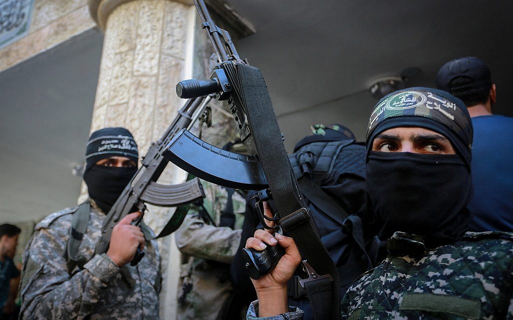 Fighters from the Hamas terror group at a funeral in Gaza City on September 25, 2018, for a Palestinian who died the day before in clashes with Israeli troops along the border. (Abed Rahim Khatib/Flash90)