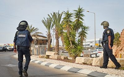 Israeli security forces at the scene of a shooting attack in Barkan industrial zone in the West Bank on October 7, 2018 (Flash90)