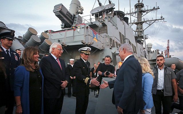Prime Minister Benjamin Netanyahu, third right, and US Ambassador David Friedman, third left, aboard the US Navy's guided-missile destroyer USS Ross, docked at Ashdod Port on October 11, 2018. (Marc Israel Sellem/Pool/Flash90)