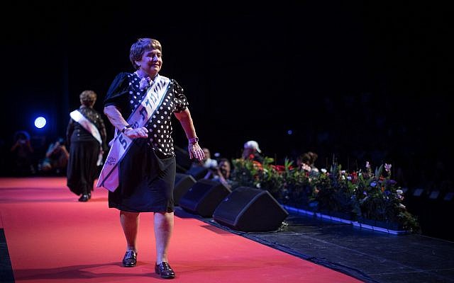 Holocaust survivors participate in a beauty pageant, in the northern Israeli city of Haifa, on October 14, 2018. (Hadas Parush/Flash90)