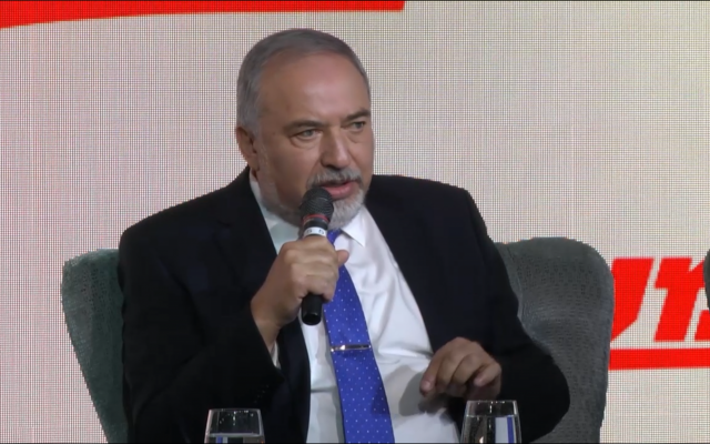 Defense Minister Avigdor Liberman speaks on stage, at the Maariv conference in Jerusalem, October 15, 2018. (Screen capture)