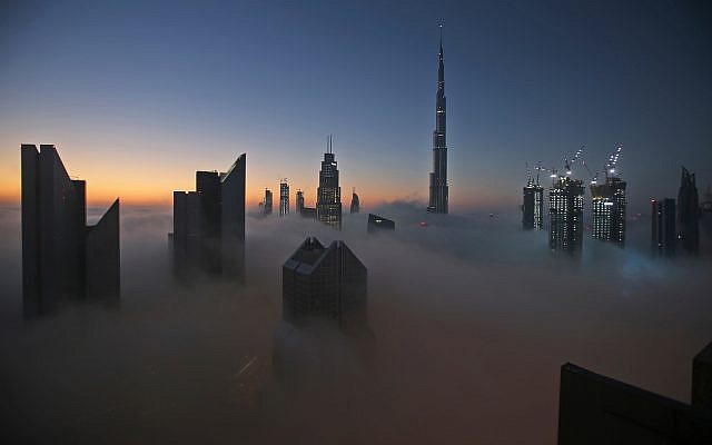 The sun rises over the Dubai skyline with the Burj Khalifa, the world's tallest building at 830 meters, at the backdrop. The number of skyscrapers worldwide has exploded in recent years. (AP Photo/Kamran Jebreili)