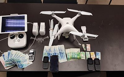 Illustration: Drone, money and cellphones seized in a twarted attempt to fly contraband into southern Israel prison (Police spokesman's unit)
