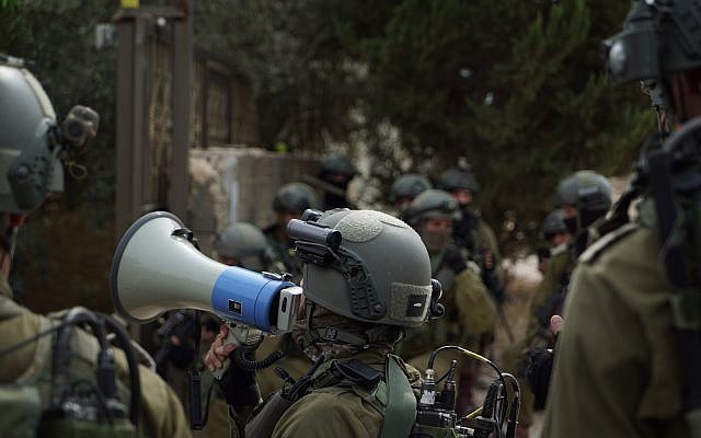File: Israeli troops take part in operations in the northern West Bank village of Shuweika on October 7, 2018, amid the manhunt for Barkan shooter Ashraf Na'alowa. (Israel Defense Forces)
