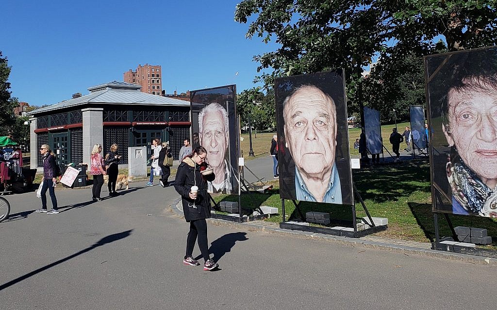 'Lest We Forget' installation of Holocaust survivor portraits in Boston Common, Boston, Massachusetts, October 16, 2018 (Matt Lebovic/The Times of Israel)