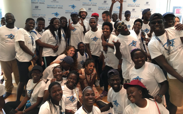 In September 2018, members of the Ugandan Jewish community participated in its first Birthright trip. Asiimwe Rabbin is in the foreground, center. (Birthright Israel via JTA)