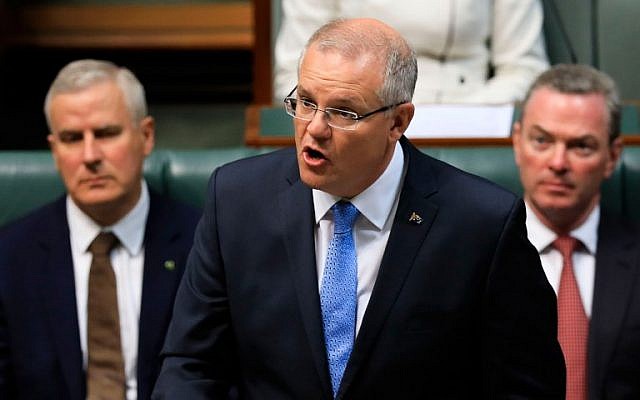 Australia's Prime Minister Scott Morrison (C) delivers a speech in the House of Representatives at Parliament House in Canberra on October 22, 2018. (Sean Davey/AFP)