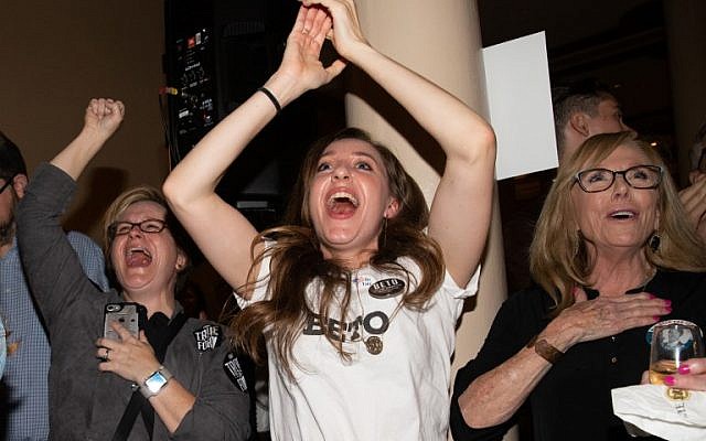 Women cheer as they watch election results at the Democrat Election Night Party held at The Driskill Hotel on November 6, 2018 in Austin, Texas. (SUZANNE CORDEIRO / AFP)
