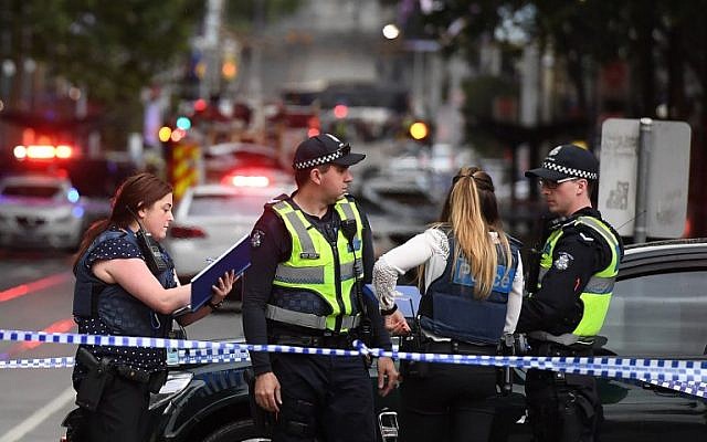 Police work at the crime scene following a stabbing incident in Melbourne on November 9, 2018. (William West/AFP)