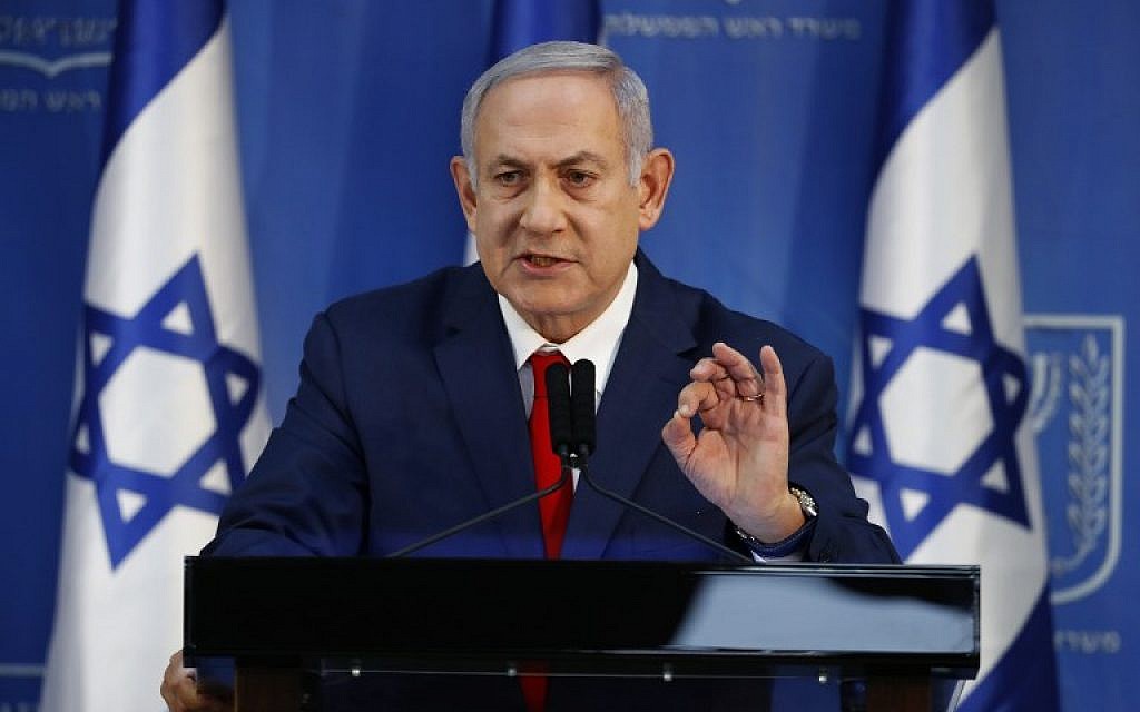 Prime Minister Benjamin Netanyahu gives a press conference at Defense Ministry headquarters in Tel Aviv on November 18, 2018. (Jack Guez/AFP)