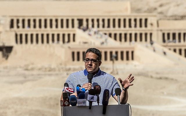 Egypt's Antiquities Minister Khaled El-Enany gives a press conference outside the Mortuary Temple of Hatshepsut on the west bank of the Nile north of the southern city of Luxor on November 24, 2018. (Khaled DESOUKI / AFP)
