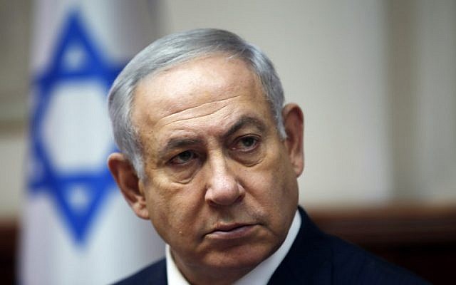 Prime Minister Benjamin Netanyahu attends the weekly cabinet meeting in Jerusalem, on November 25, 2018. (Ronen Zvulun/Pool/AFP)