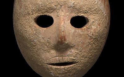A 9,000-year-old stone mask discovered in the South Hebron Hills area of the West Bank in early 2018. (Clara Amit, Israel Antiquities Authority)