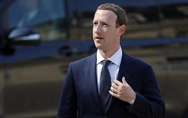 Facebook's CEO Mark Zuckerberg arrives to meet France's President Emmanuel Macron after the "Tech for Good" Summit at the Elysee Palace in Paris on May 23, 2018. (AP Photo/Francois Mori)
