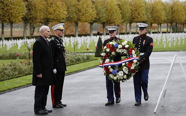 White House Chief of Staff John Kelly, left, and Chairman of the Joint Chiefs of Staff, Marine Gen. Joseph Dunford attend a ceremony at the Aisne Marne American Cemetery near the Belleau Wood battleground, in Belleau, France, Saturday, Nov. 10, 2018. (AP/Francois Mori)